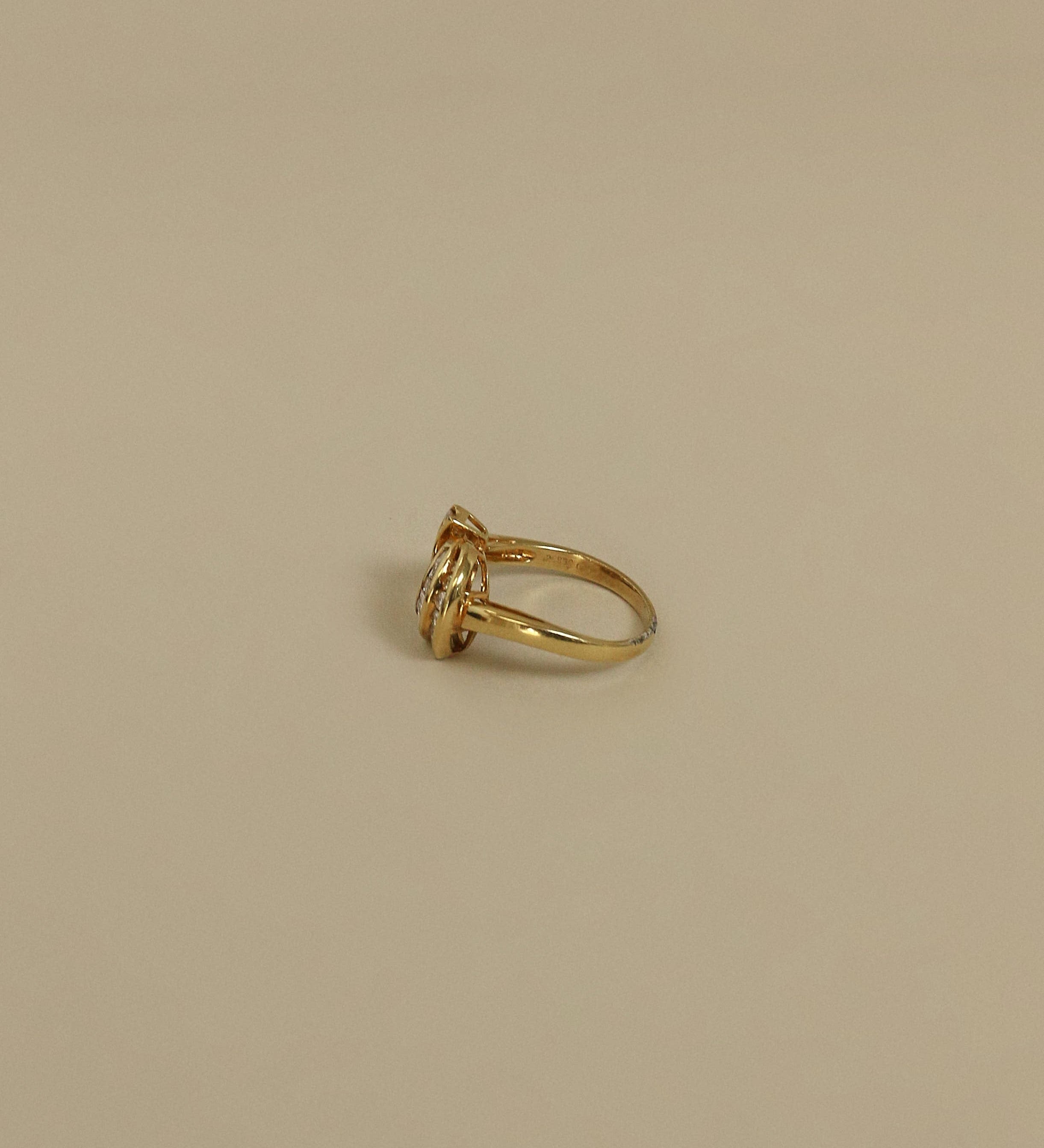 Kinn - Vintage 18k Baguette and Round Arch Diamond Ring