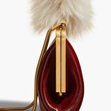 Khaite - Small Lilith Evening Bag in Oxblood Crackle Patent Leather with Shearling
