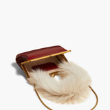 Khaite - Small Lilith Evening Bag in Oxblood Crackle Patent Leather with Shearling