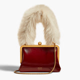 Khaite - Small Lilith Evening Bag in Oxblood Crackle Patent Leather with Shearling