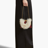 Khaite - Small Lilith Evening Bag in Oxblood Crackle Patent Leather with Shearling