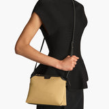 Khaite - Lina Crossbody Bag in Honey Canvas with Black Leather