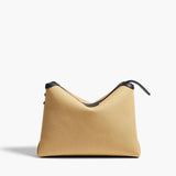 Khaite - Lina Crossbody Bag in Honey Canvas with Black Leather