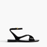 Khaite - Liria Ankle Strap Flat Sandal in Black Glazed Leather