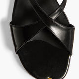 Khaite - Liria Ankle Strap Flat Sandal in Black Glazed Leather