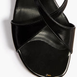 Khaite - Liria Ankle Strap Sandal in Black Glazed Leather