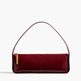 Khaite - Lori Baguette Bag in Bordeaux Crackle Patent Leather