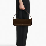 Khaite - Lori Baguette Bag in Chestnut Crackle Patent Leather