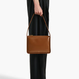 Khaite - Lori Squared Bag in Dark Honey Crackle Patent Leather
