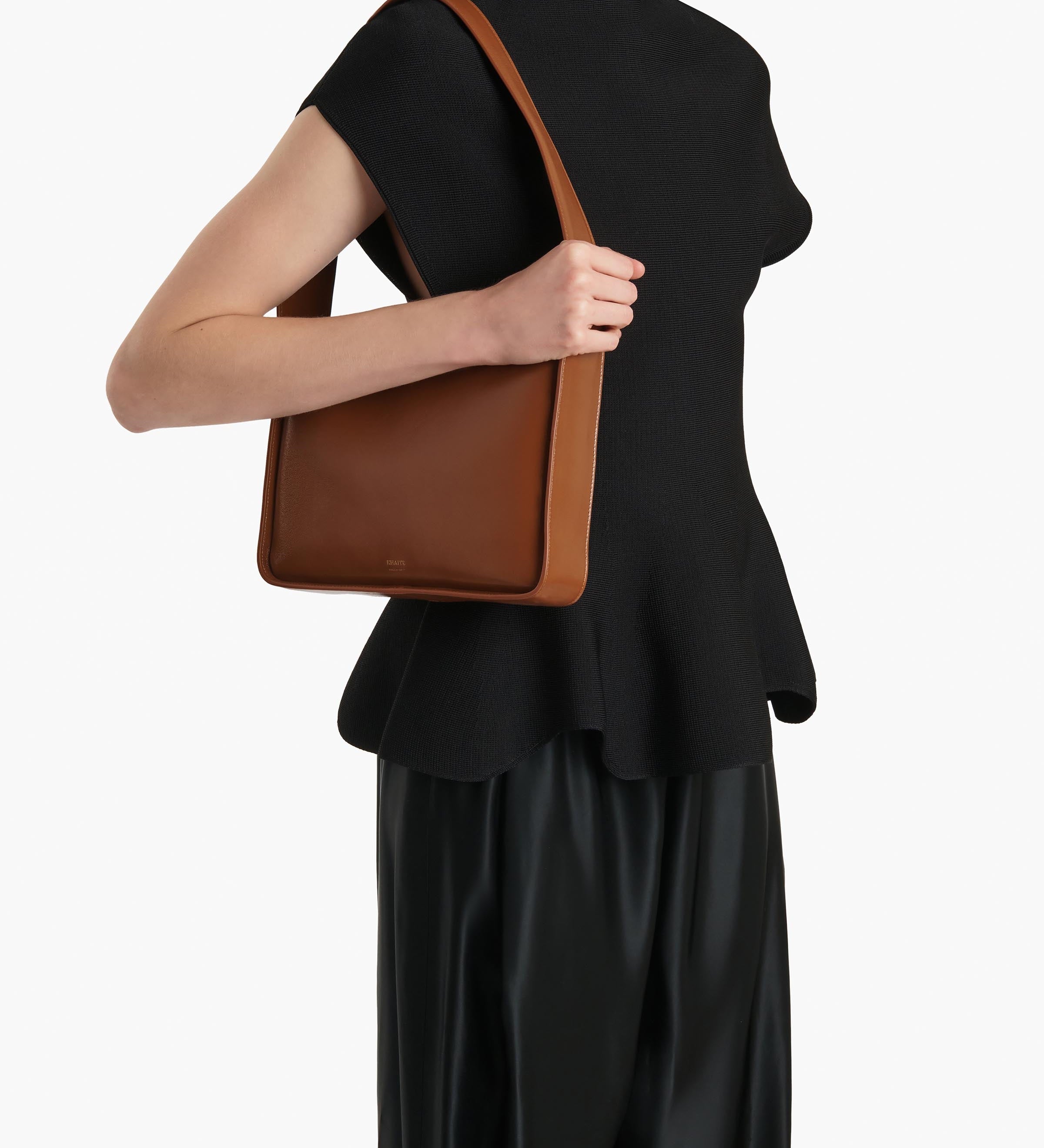 Khaite - Lori Squared Bag in Dark Honey Crackle Patent Leather