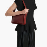 Khaite - Lori Squared Bag in Oxblood Crackle Patent Leather