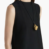 Khaite - Medium Lotus Pendant in Gold