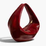 Khaite - Medium Olivia Hobo in Oxblood Crackle Patent Leather