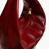 Khaite - Medium Olivia Hobo in Oxblood Crackle Patent Leather