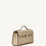 side view of the Symmetry Pochette handbag in Bone leather 
