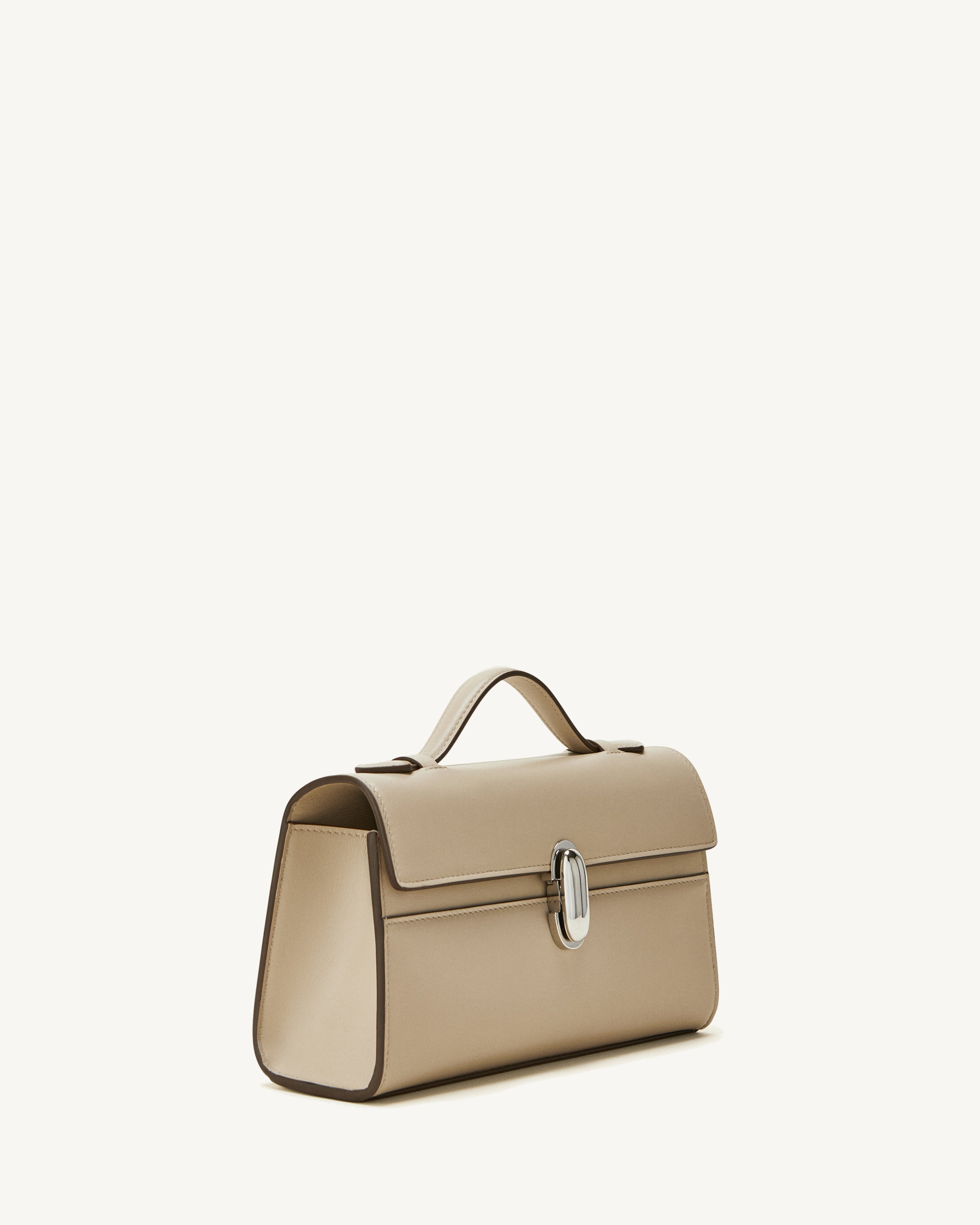 side view of the Symmetry Pochette handbag in Bone leather 