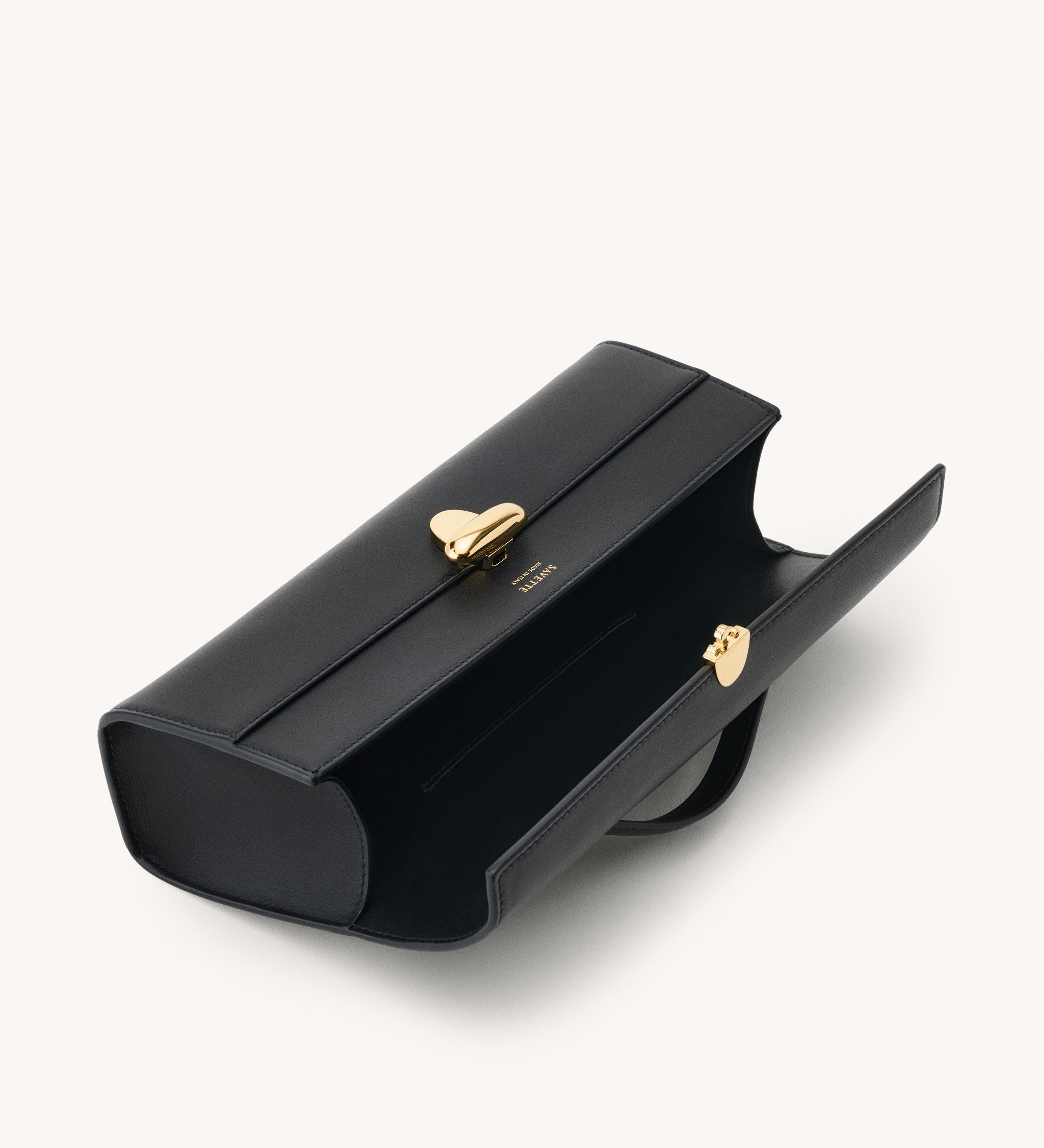 Inside view of the Slim Symmetry Pochette handbag in Black leather 