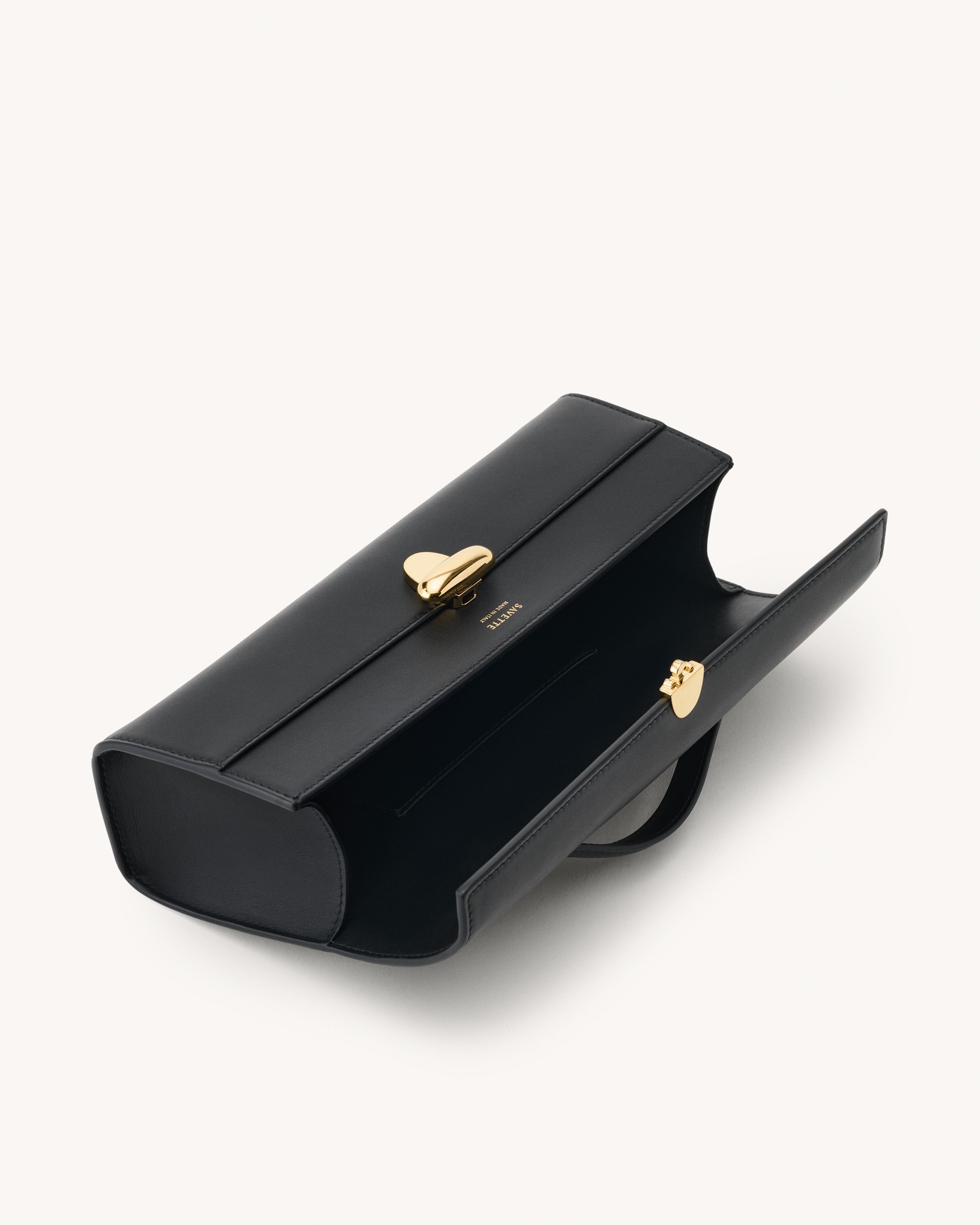 Inside view of the Slim Symmetry Pochette handbag in Black leather 