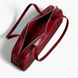 Khaite - Simona Shoulder Bag in Oxblood Crackle Patent Leather