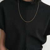 Toteme - Slouch waist basketweave top black