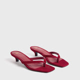Toteme - Suede heeled flip flops scarlet