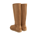 Image 3 of 4 - BROWN - Ugg Women's Classic Ultra Tall Boot is a sky-high version of the iconic style. Featuring a 15-inch shaft height, plush sheepskin lining, and an ultra-lightweight rubber outsole for comfort. Main Material: 17mm Twinface Sheepskin. Lining: 17mm Sheepskin. Insole: 17mm Sheepskin. Sole: Sugarcane EVA. Details: Overlock Stitch Seams. 