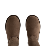 Image 4 of 4 - BROWN - Ugg Women's Classic Ultra Tall Boot is a sky-high version of the iconic style. Featuring a 15-inch shaft height, plush sheepskin lining, and an ultra-lightweight rubber outsole for comfort. Main Material: 17mm Twinface Sheepskin. Lining: 17mm Sheepskin. Insole: 17mm Sheepskin. Sole: Sugarcane EVA. Details: Overlock Stitch Seams. 