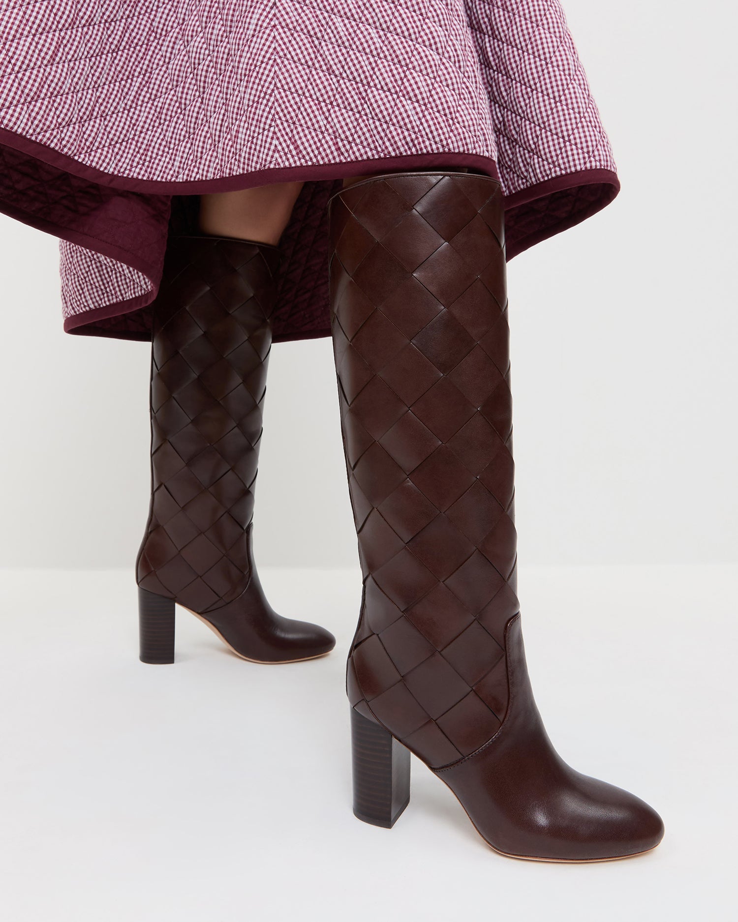 Goldy Espresso Woven Leather Tall Boot in espresso woven leather and Clara Quilted Skirt in maroon gingham.