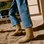 Jett Sand Suede Calf Boot in sand tan suede and western inspired and Molly Workwear Jean in medium washed denim.