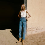 Jett Sand Suede Calf Boot in sand tan suede and western inspired, Runa Top in white cotton, and Molly Workwear Jean in medium washed denim.