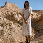 Jo Puff-Sleeve Dress in cream cotton and Wilder Brown Leather Tulip Boot.