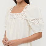Jo Puff-Sleeve Dress in cream cotton.