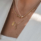 Kinn - Mini Horseshoe Baguette Diamond Charm