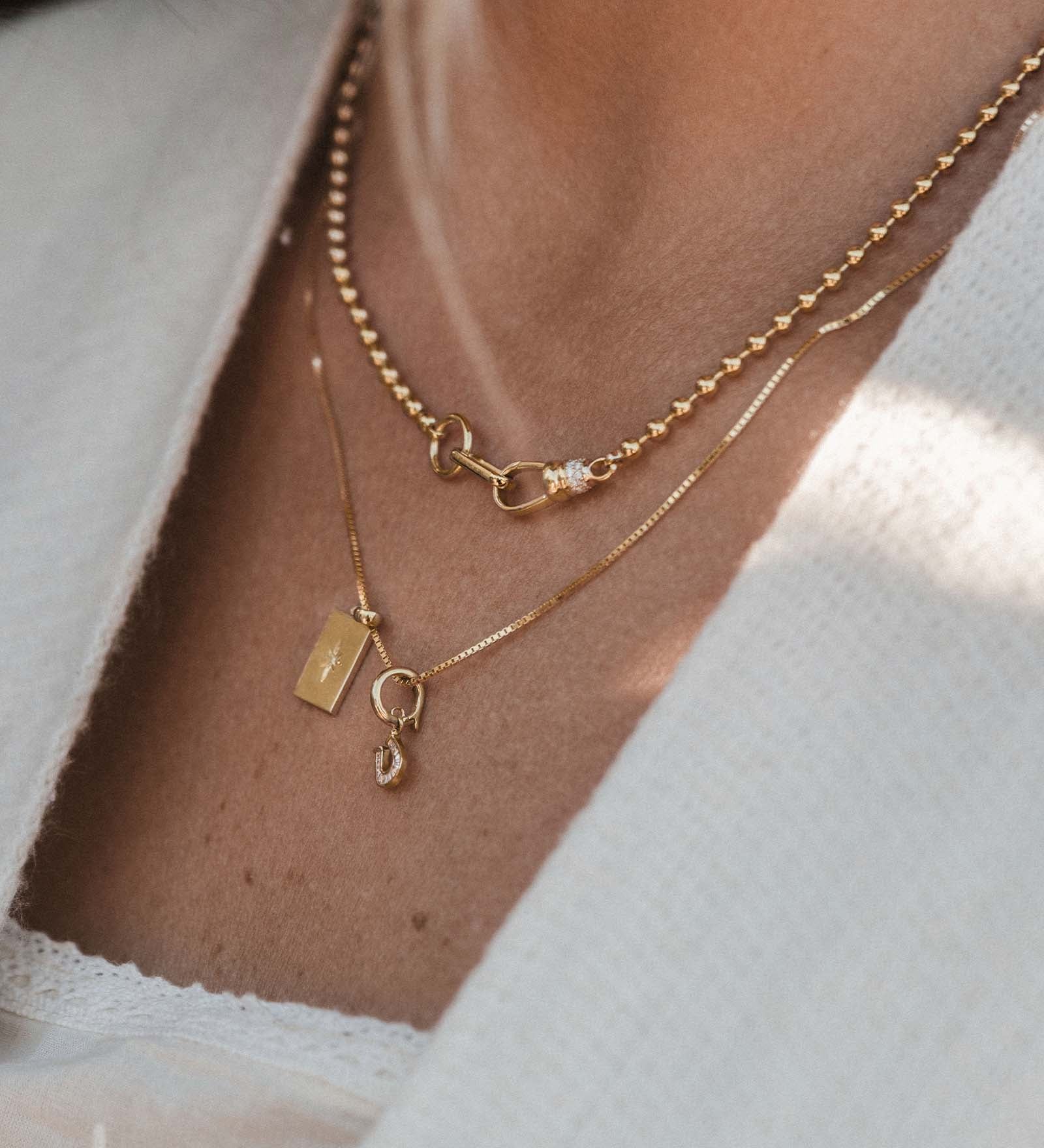 Kinn - Mini Horseshoe Baguette Diamond Charm