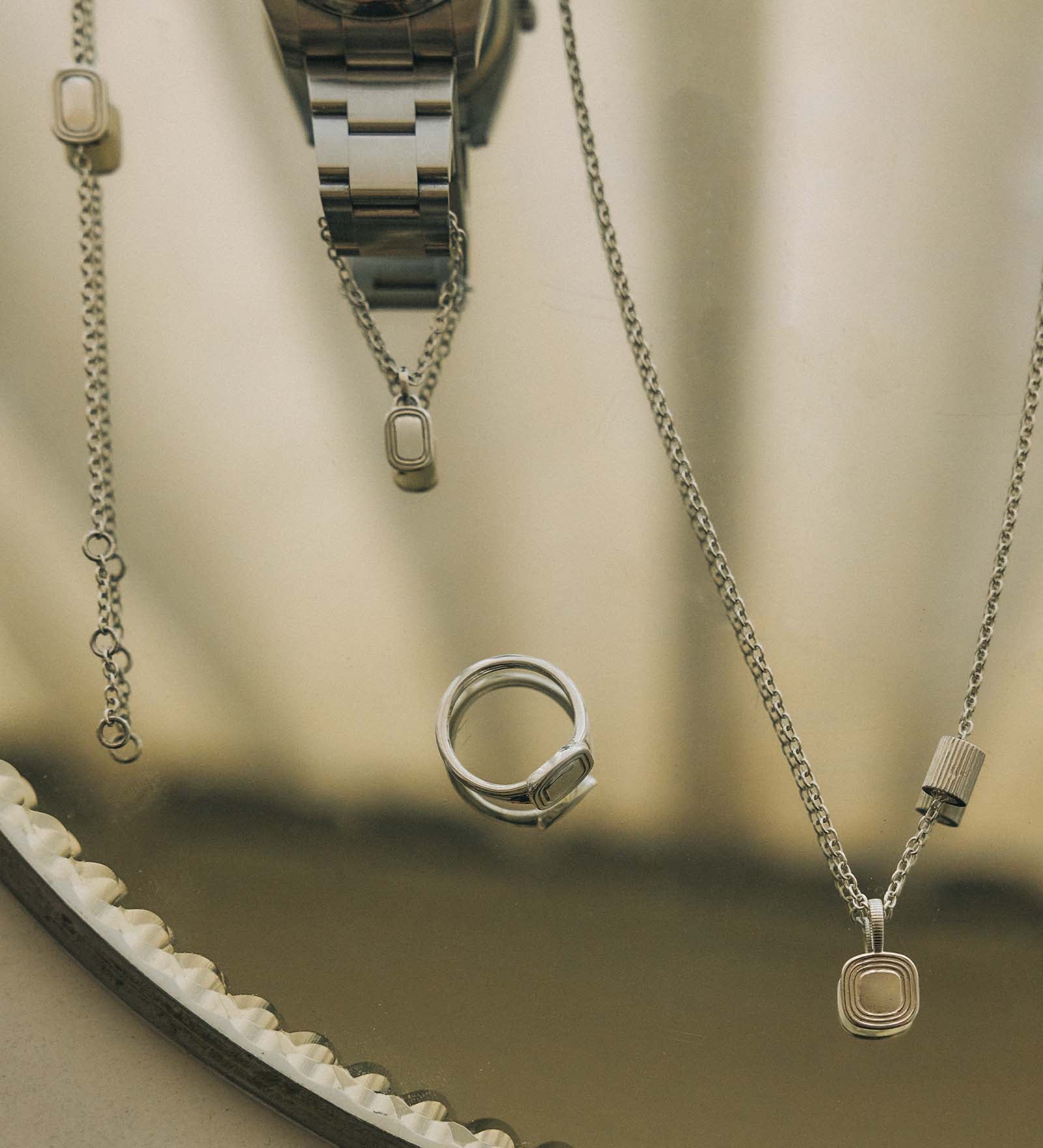Kinn - The Estate Charm Silver