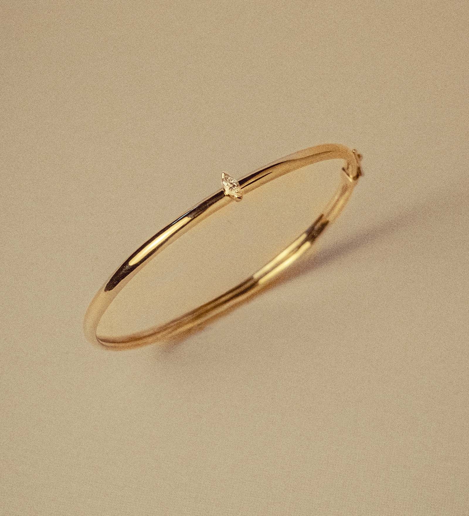 Kinn - Vintage 14k Gold Bangle with Marquise Diamond