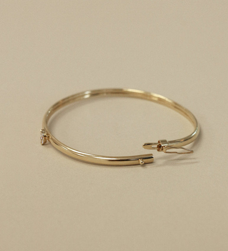 Kinn - Vintage 14k Gold Bangle with Marquise Diamond