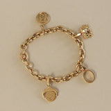 Kinn - Vintage 18k Gold Cartier Charm Bracelet
