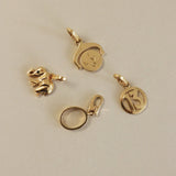 Kinn - Vintage 18k Gold Cartier Charm Bracelet
