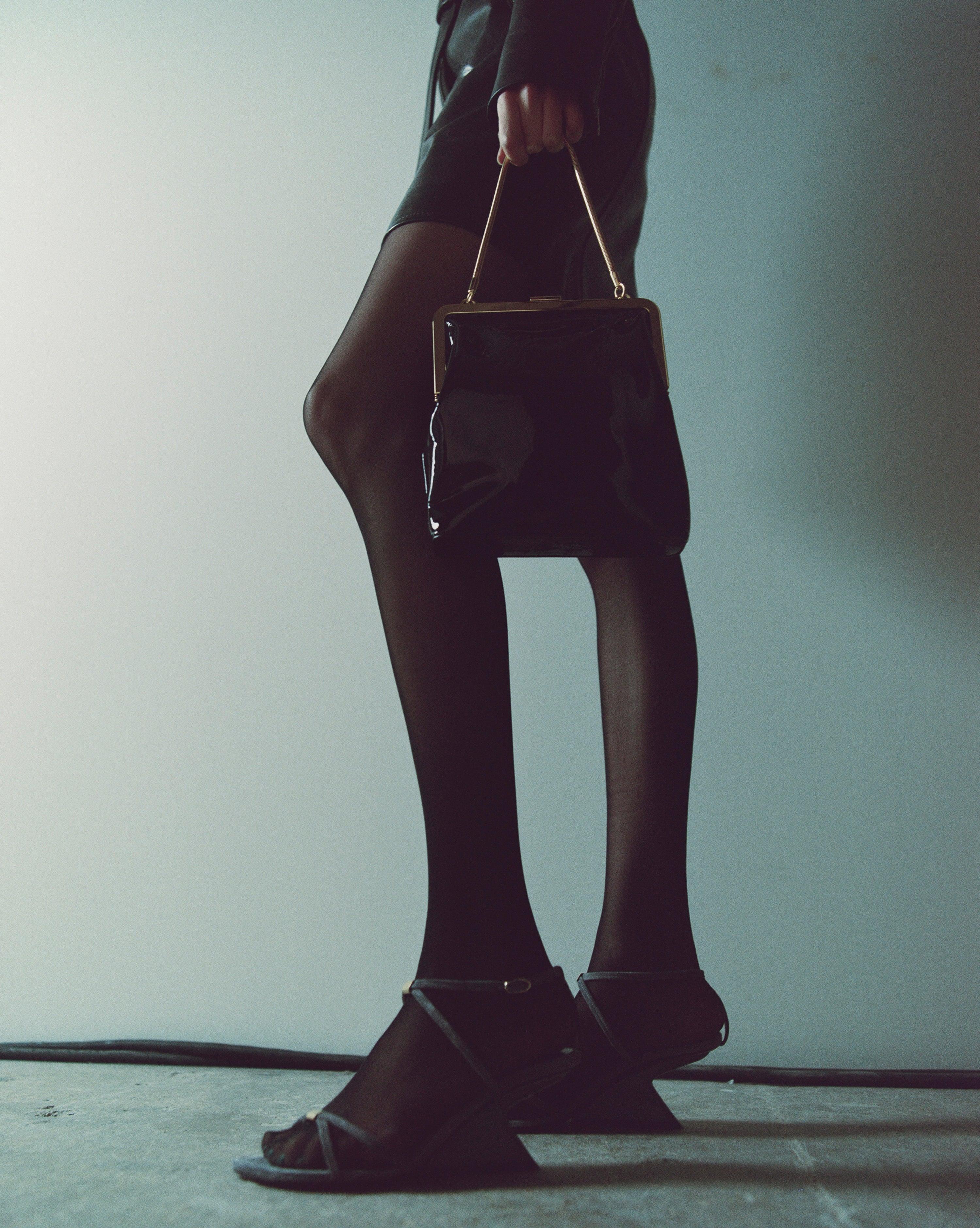 The Lilith Evening Bag in Black Patent Leather - The Iconic Issue