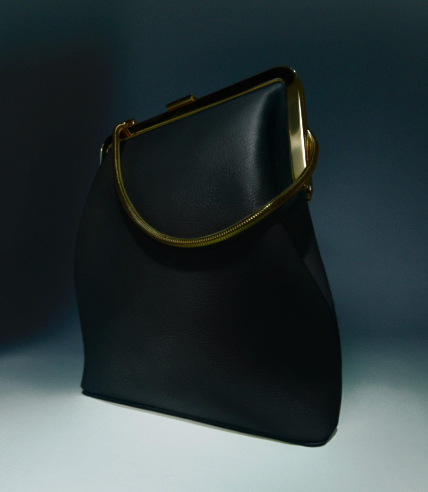 The Lilith Evening Bag in Black Leather - The Iconic Issue