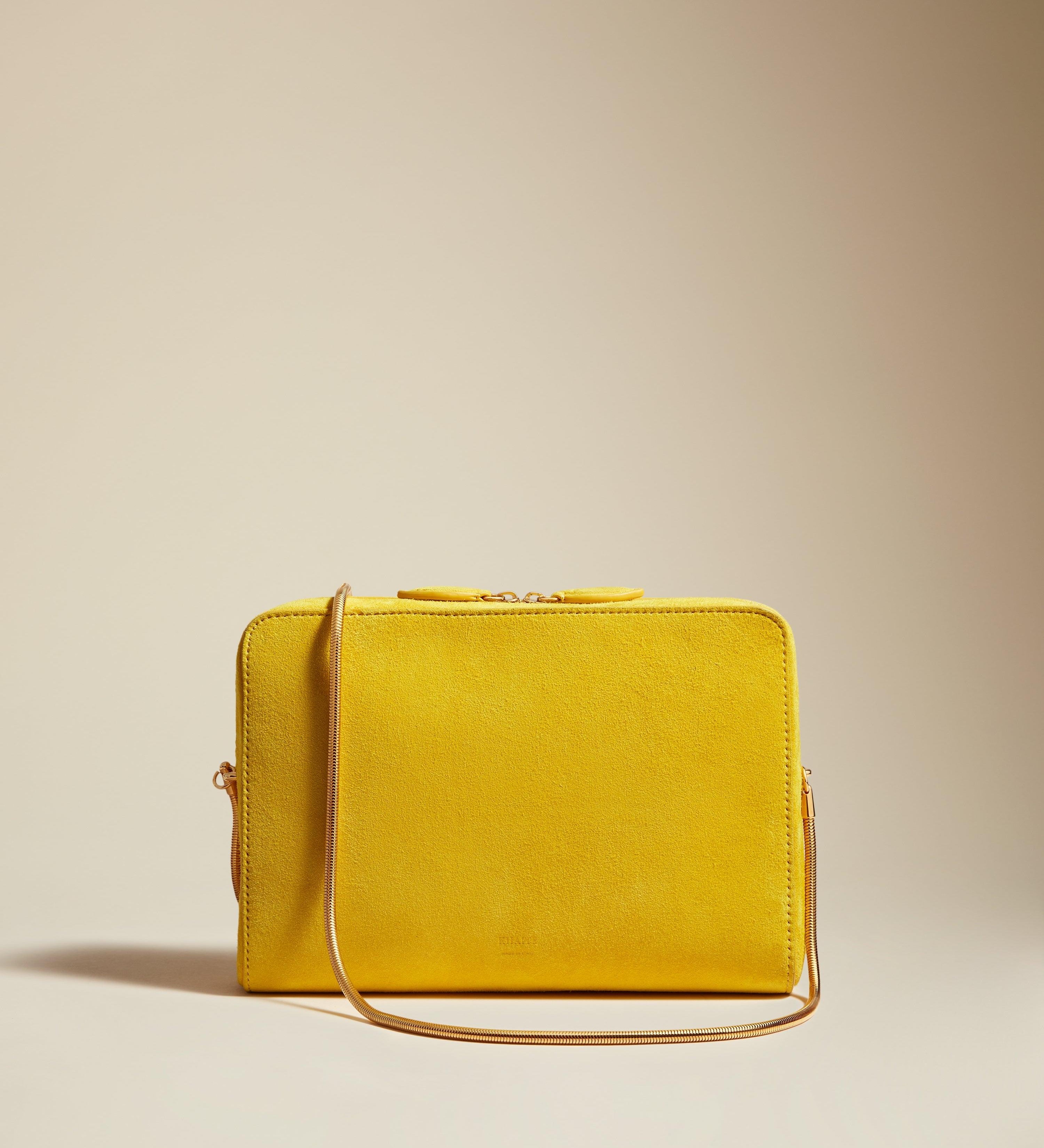 The Anna Crossbody Bag in Lemon Suede - The Iconic Issue