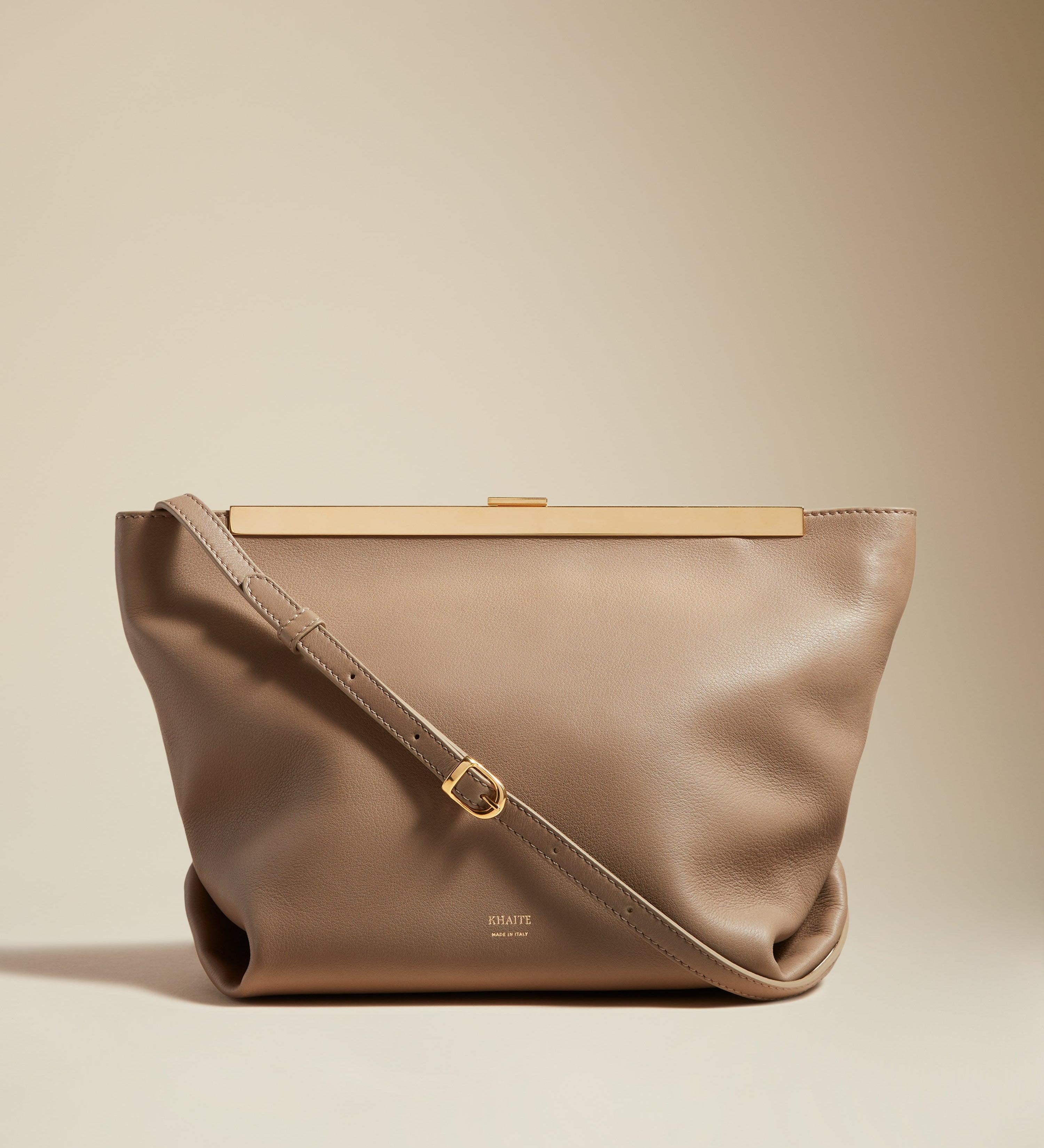 The Augusta Crossbody Bag in Taupe Pebbled Leather - The Iconic Issue
