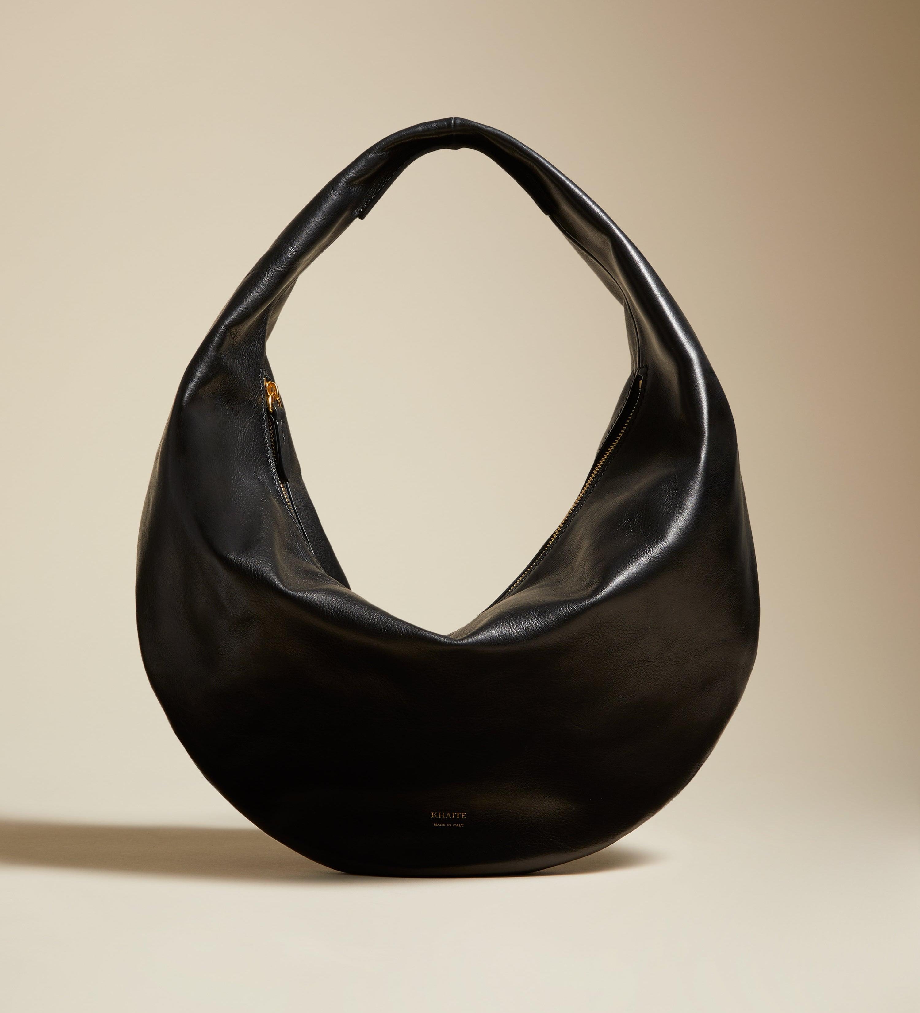 The Medium Olivia Hobo in Black Leather - The Iconic Issue