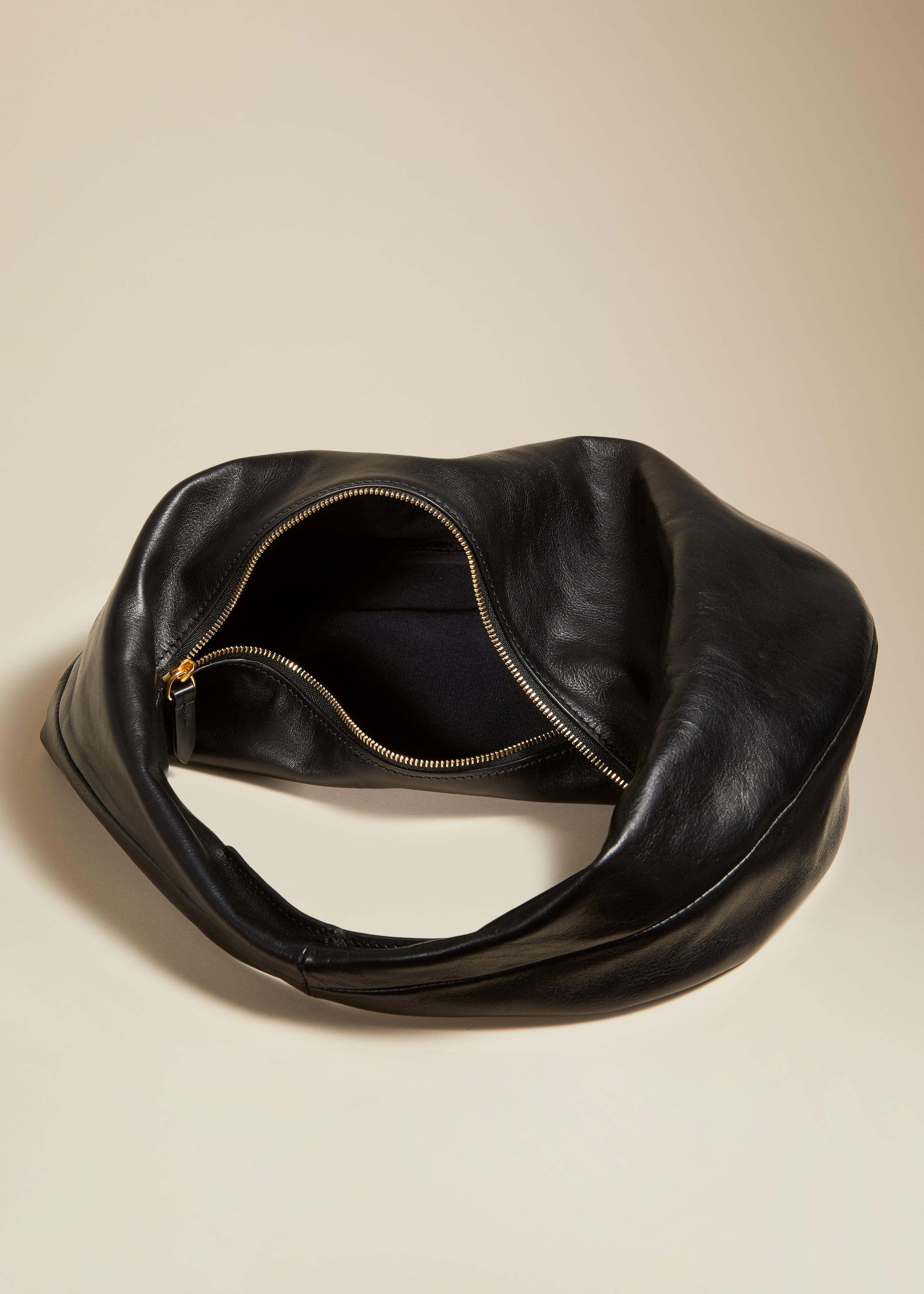 The Medium Olivia Hobo in Black Leather - The Iconic Issue